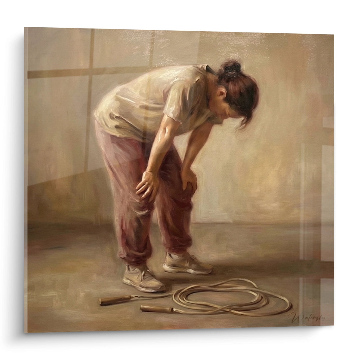 Tableau d'une ballerine se penchant pour ajuster ses chaussons de danse avec corde à sauter au sol