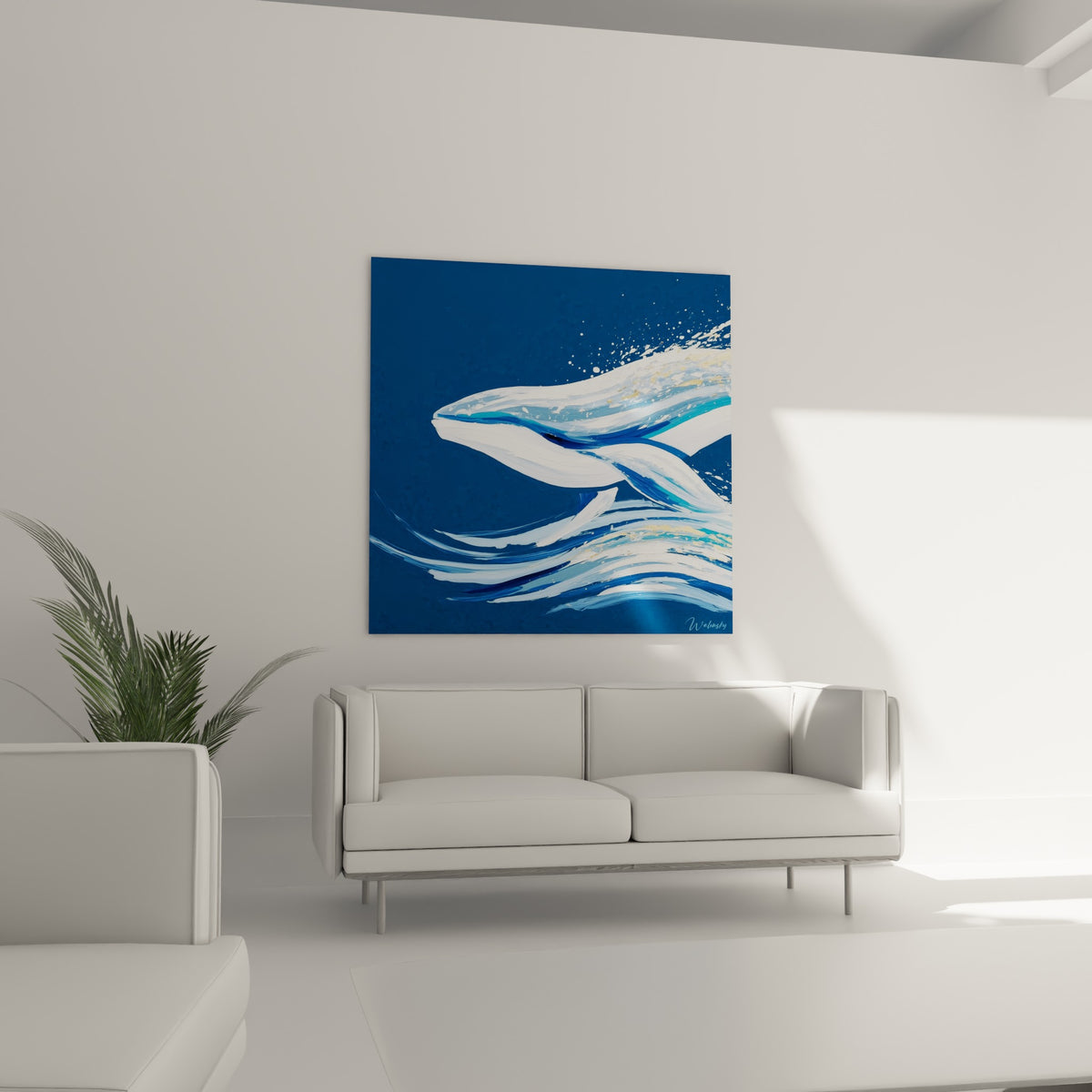Baleine anthracite et blanche surgissant des vagues au-dessus d'un canapé dans un salon lumineux
