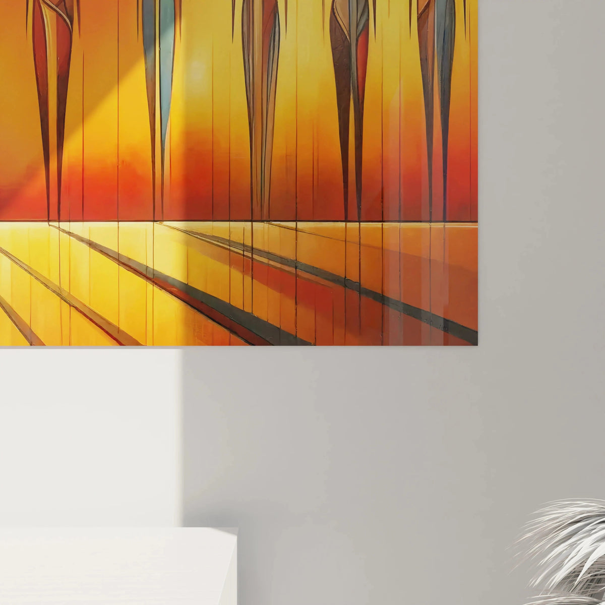 Vue rapprochée du tableau africain, ses cercles solaires et silhouettes stylisées sont magnifiés. Les teintes chaudes de rouge et d’orange évoquent l’harmonie et la spiritualité.

