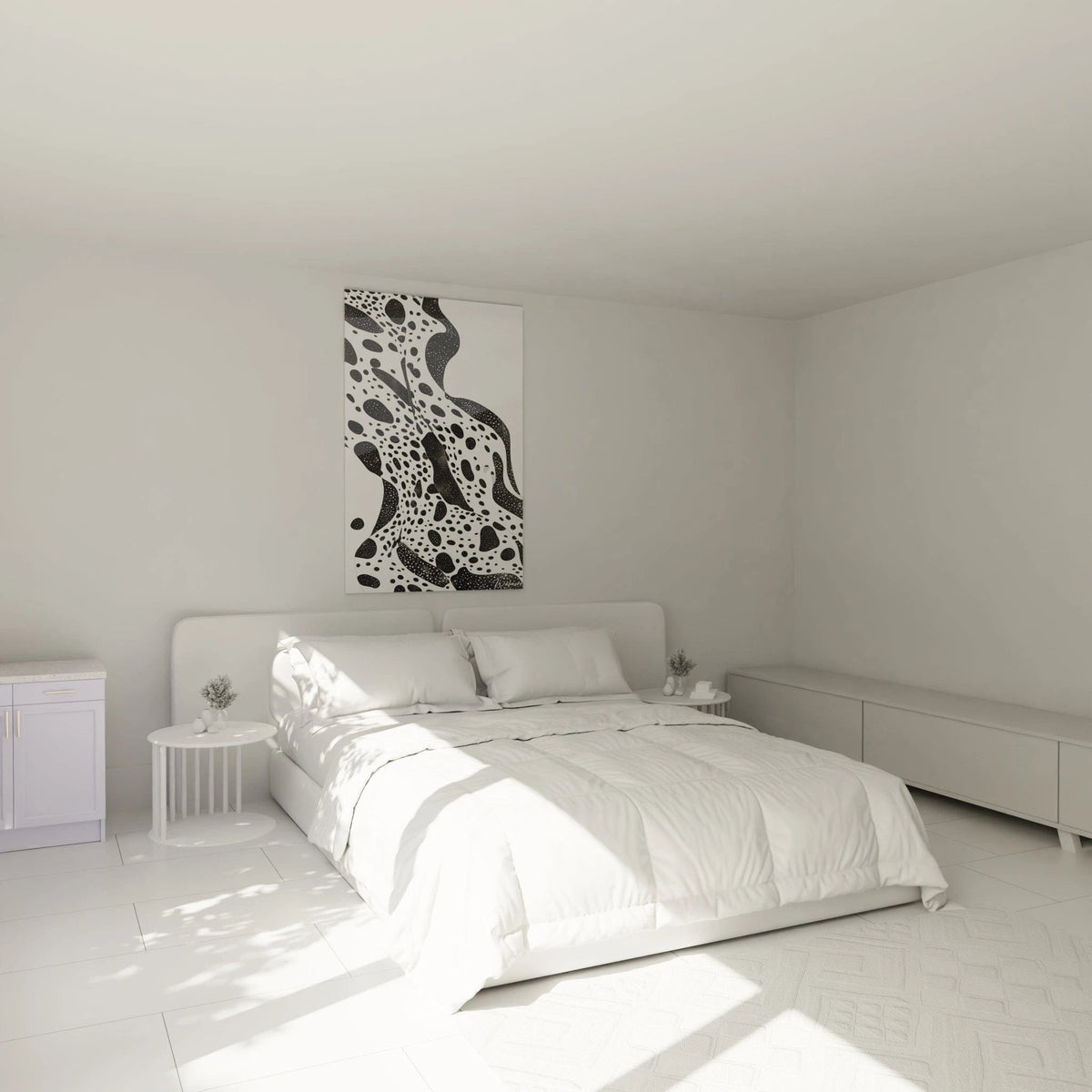 Tableau tacheté noir et blanc Walensky accroché dans une chambre moderne lumineuse